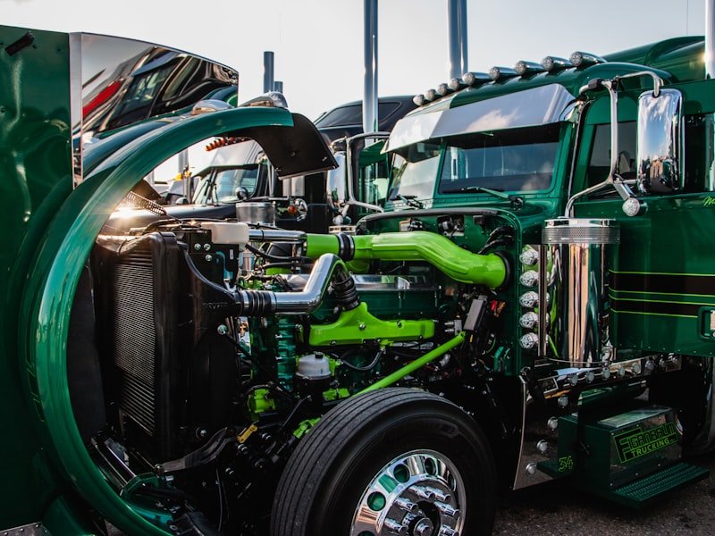 Commercial semi truck with engine bay open for preventive maintenance